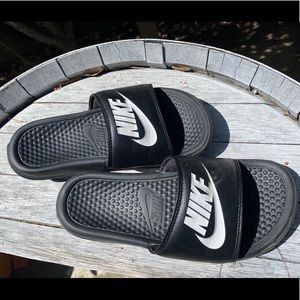 Black and white Nike slides